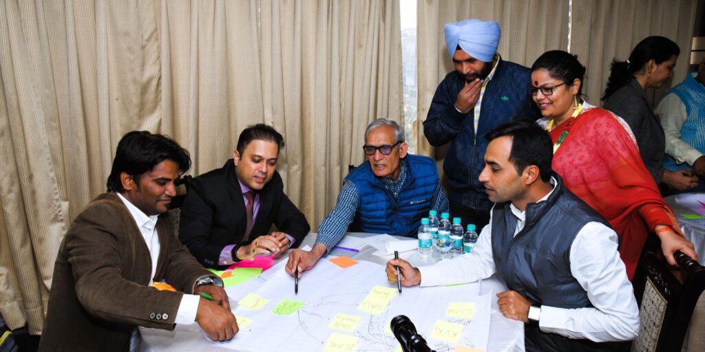 Participants discuss a stakeholder map during an Enabling Data Access project workshop in India, 2022 (Credit: CABI)