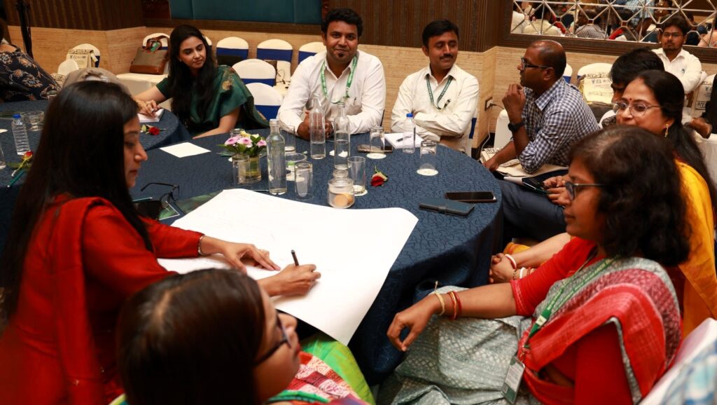 Participants discuss key topics during the workshop (credit: CABI and CRRI)