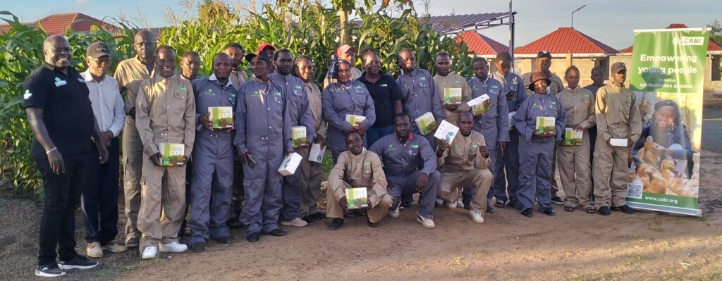 Outside group photo of young women and men undertaking agribusiness training in Kenya